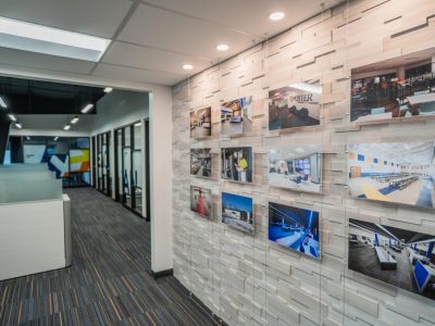 Wall of projects at Eagan corporate office